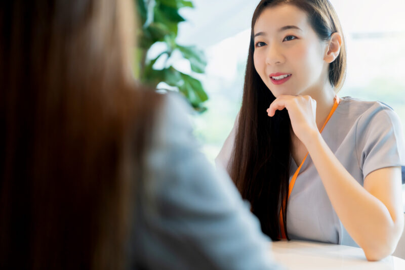 Interview job recruitment concept attractive asian female answer question between meeting room human resource job head hunter interview