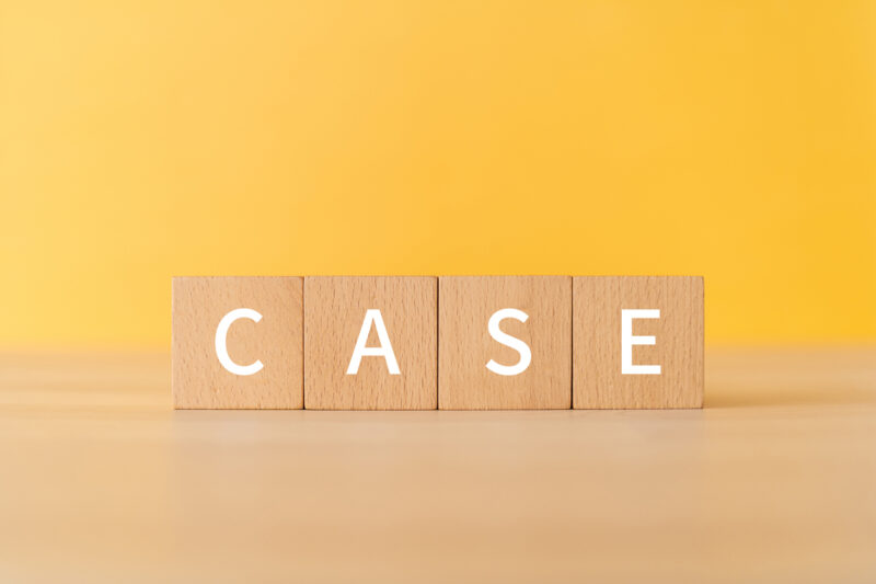 Wooden blocks with "CASE" text of concept.