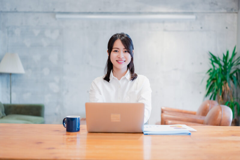 Young woman using a computer in her office